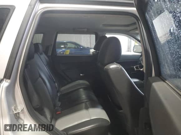 2010 Jeep Grand Cherokee Laredo with VIN 1J4RR4GT7AC141856, listed as a Copart auction lot 83797225 with 61,435 mi miles and Salvage title. Bid and sale history available at DreamBid. Image 11.