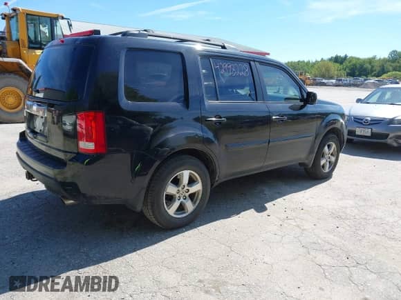 2010 Honda Pilot EX with VIN 5FNYF3H45AB014957, listed as a IAAI auction lot 42998228 with 210,291 mi miles and . Bid and sale history available at DreamBid. Image 4.
