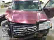 2012 Honda Pilot EX with VIN 5FNYF4H44CB027210, listed as a Copart auction lot 66487595 with 184,570 mi miles and Salvage title. Bid and sale history available at DreamBid. Image 12.