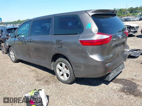 2015 Toyota Sienna L with VIN 5TDZK3DC7FS564872, listed as a IAAI auction lot 43053204 with 249,172 mi miles and . Bid and sale history available at DreamBid. Image 3.