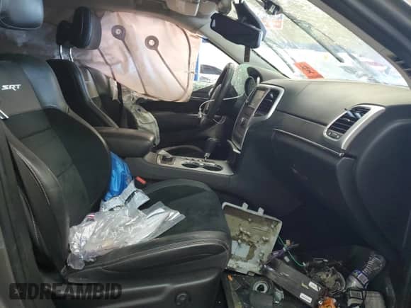 2012 Jeep Grand Cherokee SRT-8 z VIN 1C4RJFDJ8CC205823, wystawiony jako Copart lot #48073195 z przebiegiem 133 828 mil mil oraz Szkoda całkowita • Salvage title. Historia ofert i sprzedaży dostępna na DreamBid. Obrazek 7.