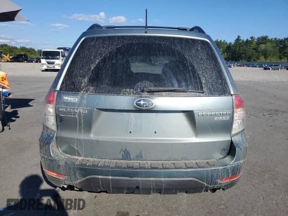 2010 Subaru Forester X Premium with VIN JF2SH6CC2AH754726, listed as a Copart auction lot 80650405 with 136,688 mi miles and Salvage title. Bid and sale history available at DreamBid. Image 6.