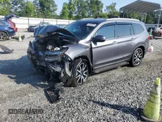 2020 Honda Pilot Elite с VIN 5FNYF6H00LB044305, выставлен на аукционе Copart как лот 62680805 с пробегом Не указан миль и Списание • Salvage title. История ставок и продаж доступна на DreamBid. Изображение 1.