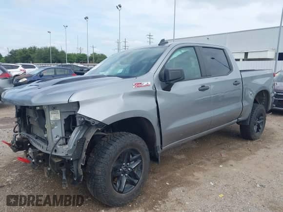 2024 Chevrolet Silverado 1500 Custom Trail Boss with VIN 3GCUDCED0RG315926, listed as a IAAI auction lot 42742429 with 23,714 mi miles and . Bid and sale history available at DreamBid. Image 2.