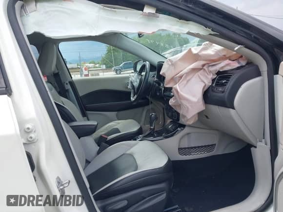 2018 Jeep Compass Limited with VIN 3C4NJCCB1JT188498, listed as a IAAI auction lot 42717751 with 84,227 mi miles and . Bid and sale history available at DreamBid. Image 5.