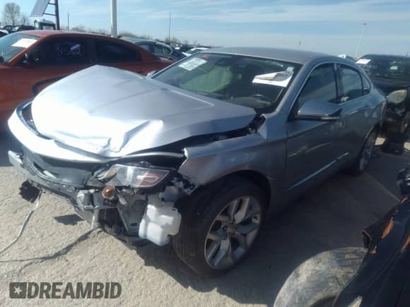 2015 Chevrolet Impala LTZ with VIN 1G1155SL8FU145775, listed as a IAAI auction lot 40390001 with 95,612 mi miles and . Bid and sale history available at DreamBid. Image 2.