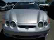 2001 Hyundai Tiburon z VIN KMHJG25F11U258137, wystawiony jako Copart lot #63812855 z przebiegiem 27 682 mil mil oraz Czysty tytuł • Clean title. Historia ofert i sprzedaży dostępna na DreamBid. Obrazek 5.