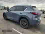 2023 Mazda CX-5 S Carbon Edition z VIN JM3KFBCM3P0135072, wystawiony jako Copart lot #81649475 z przebiegiem 21 569 mil mil oraz Szkoda całkowita • Salvage title. Historia ofert i sprzedaży dostępna na DreamBid. Obrazek 2.