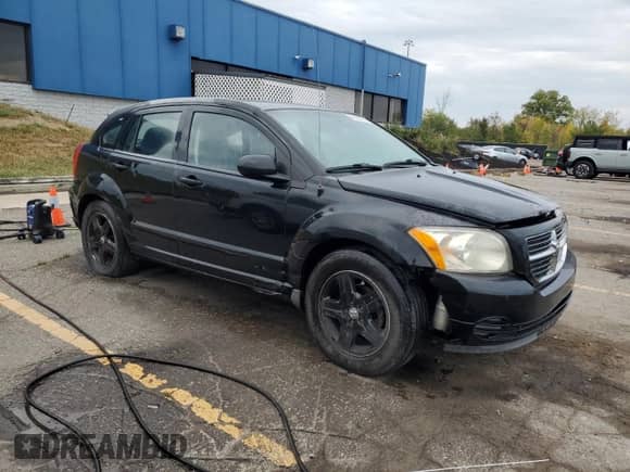 2009 Dodge Caliber SXT z VIN 1B3HB48A59D104346, wystawiony jako Copart lot #81551775 z przebiegiem 211 208 mil mil oraz Szkoda całkowita • Salvage title. Historia ofert i sprzedaży dostępna na DreamBid. Obrazek 4.