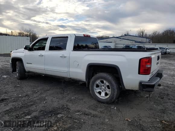 2014 GMC Sierra 1500 SLE z VIN 3GTU2UEC7EG123464, wystawiony jako Copart lot #86570794 z przebiegiem 121 217 mil mil oraz Szkoda całkowita • Salvage title. Historia ofert i sprzedaży dostępna na DreamBid. Obrazek 2.