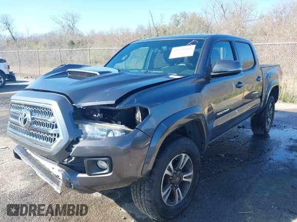 2017 Toyota Tacoma TRD Off Road with VIN 5TFAZ5CN2HX027623, listed as a IAAI auction lot 41731461 with 103,232 mi miles and . Bid and sale history available at DreamBid. Image 17.