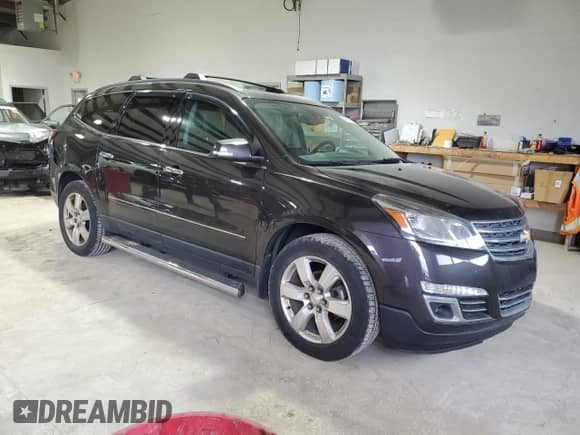 2017 Chevrolet Traverse Premier with VIN 1GNKVJKD7HJ194278, listed as a Copart auction lot 43832635 with 136,971 mi miles and Salvage title. Bid and sale history available at DreamBid. Image 4.
