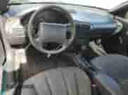 1999 Chevrolet Cavalier with VIN 1G1JC124XX7176470, listed as a Copart auction lot 89696255 with 94,486 mi miles and Salvage title. Bid and sale history available at DreamBid. Image 8.