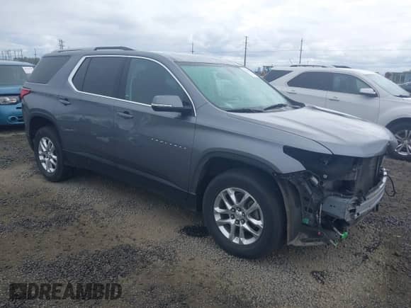 2018 Chevrolet Traverse LT Cloth z VIN 1GNEVGKW1JJ241702, wystawiony jako IAAI lot #42894625 z przebiegiem 84 567 mil mil oraz . Historia ofert i sprzedaży dostępna na DreamBid. Obrazek 1.