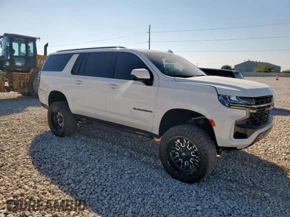 2021 Chevrolet Suburban Z71 with VIN 1GNSKDKD3MR441110, listed as a Copart auction lot 70474075 with 70,456 mi miles and Salvage title. Bid and sale history available at DreamBid. Image 4.