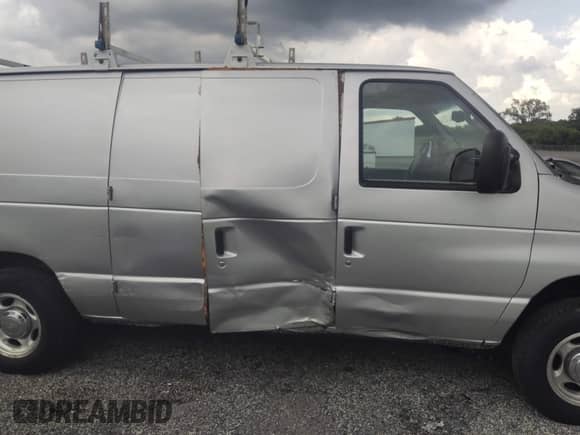 2012 Ford Econoline Cargo Commercial with VIN 1FTNE1EW0CDA89656, listed as a IAAI auction lot 42579010 with 204,112 mi miles and . Bid and sale history available at DreamBid. Image 6.