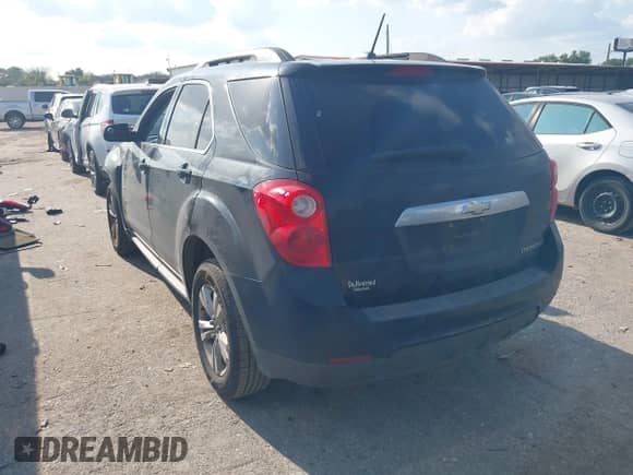 2015 Chevrolet Equinox LT z VIN 2GNALCEK9F6111144, wystawiony jako IAAI lot #43263813 z przebiegiem 165 604 mil mil oraz . Historia ofert i sprzedaży dostępna na DreamBid. Obrazek 3.
