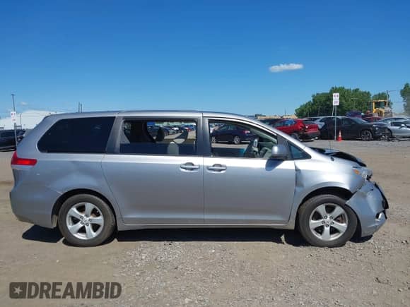 2012 Toyota Sienna with VIN 5TDKA3DC8CS014421, listed as a IAAI auction lot 42796292 with 227,527 mi miles and . Bid and sale history available at DreamBid. Image 13.
