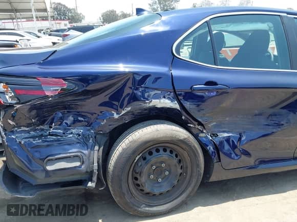 2022 Toyota Camry Hybrid LE with VIN 4T1C31AK0NU576130, listed as a IAAI auction lot 42382718 with 70,749 mi miles and . Bid and sale history available at DreamBid. Image 18.