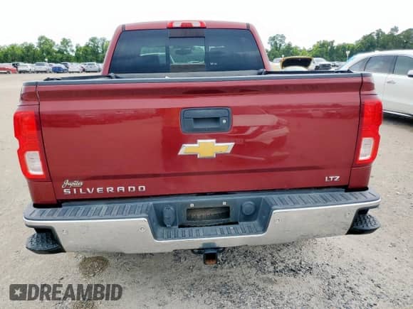 2017 Chevrolet Silverado 1500 LTZ with VIN 3GCUKSEC1HG353039, listed as a Copart auction lot 64611015 with 123,210 mi miles and Salvage title. Bid and sale history available at DreamBid. Image 6.