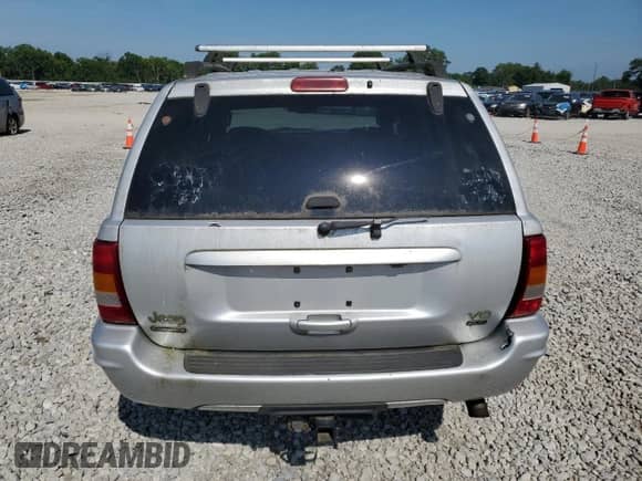 2004 Jeep Grand Cherokee Overland с VIN 1J8GW68J54C271033, выставлен на аукционе Copart как лот 66160055 с пробегом 203 651 миль миль и Чистый • Clean title. История ставок и продаж доступна на DreamBid. Изображение 6.