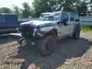 2024 Jeep Wrangler Sport S с VIN 1C4RJXN6XRW121252, выставлен на аукционе Copart как лот 65005525 с пробегом 20 476 миль миль и Списание • Salvage title. История ставок и продаж доступна на DreamBid. Изображение 1.