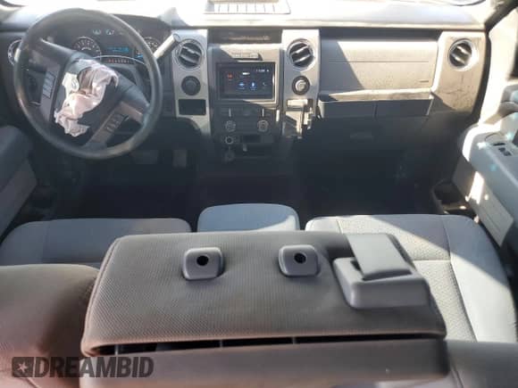 2014 Ford F-150 XL с VIN 1FTFW1EF0EFC10968, выставлен на аукционе Copart как лот 71260515 с пробегом 185 973 миль миль и Списание • Salvage title. История ставок и продаж доступна на DreamBid. Изображение 8.