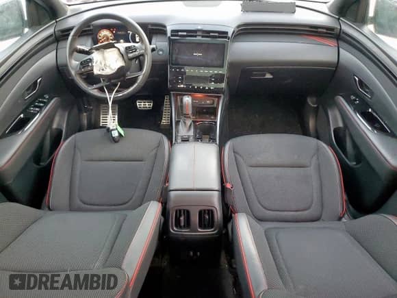 2023 Hyundai Tucson XRT z VIN KM8JFCAE9PU233646, wystawiony jako Copart lot #85669365 z przebiegiem 20 580 mil mil oraz Szkoda całkowita • Salvage title. Historia ofert i sprzedaży dostępna na DreamBid. Obrazek 8.