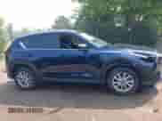 2023 Mazda CX-5 S Select with VIN JM3KFBBM4P0246358, listed as a IAAI auction lot 42812081 with 71,889 mi miles and . Bid and sale history available at DreamBid. Image 13.