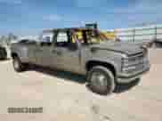 1999 Chevrolet Silverado 3500 с VIN 1GCHC33J2XF038028, выставлен на аукционе Copart как лот 50646935 с пробегом Не указан миль и На запчасти • Non repairable. История ставок и продаж доступна на DreamBid. Изображение 4.