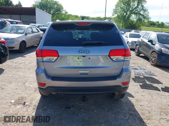 2018 Jeep Grand Cherokee Laredo z VIN 1C4RJEAG7JC407147, wystawiony jako IAAI lot #42167062 z przebiegiem 95 975 mil mil oraz . Historia ofert i sprzedaży dostępna na DreamBid. Obrazek 16.