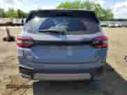 2023 Honda Pilot Elite with VIN 5FNYG1H82PB034130, listed as a Copart auction lot 56763214 with 7,710 mi miles and Salvage title. Bid and sale history available at DreamBid. Image 6.