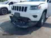 2014 Jeep Grand Cherokee Limited with VIN 1C4RJFBG4EC351033, listed as a IAAI auction lot 42870546 with 194,263 mi miles and . Bid and sale history available at DreamBid. Image 6.