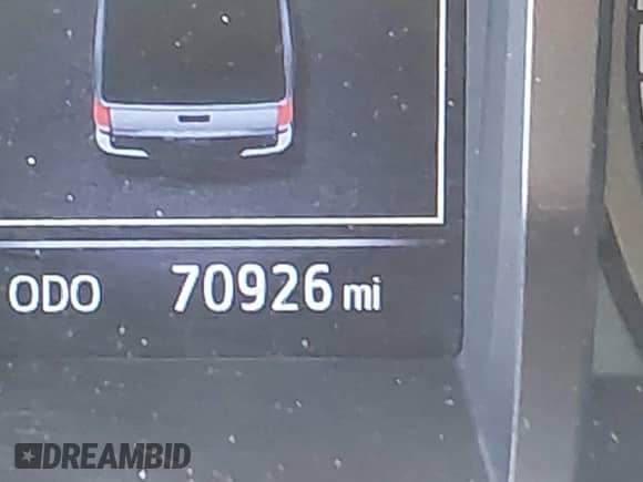 2021 Toyota Tacoma SR z VIN 5TFCZ5AN0MX262902, wystawiony jako IAAI lot #43535009 z przebiegiem 70 926 mil mil oraz . Historia ofert i sprzedaży dostępna na DreamBid. Obrazek 14.