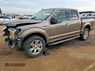 2019 Ford F-150 XLT with VIN 1FTEW1E47KKE61032, listed as a Copart auction lot 84583325 with 90,095 mi miles and Salvage title. Bid and sale history available at DreamBid. Image 1.