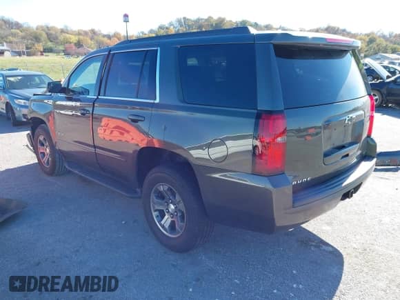 2019 Chevrolet Tahoe LS with VIN 1GNSKAKC4KR226743, listed as a IAAI auction lot 40839068 with 104,220 mi miles and . Bid and sale history available at DreamBid. Image 3.
