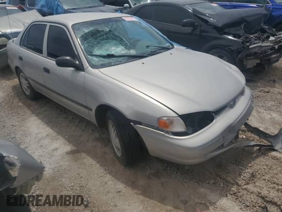 2001 Chevrolet Prizm с VIN 1Y1SK52871Z427641, выставлен на аукционе Copart как лот 55704775 с пробегом Не указан миль и Списание • Salvage title. История ставок и продаж доступна на DreamBid. Изображение 4.