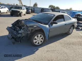 1999 Dodge Avenger with VIN 4B3AU42NXXE127845, listed as a Copart auction lot 77039954 with 113,630 mi miles and Salvage title. Bid and sale history available at DreamBid. Image 1.