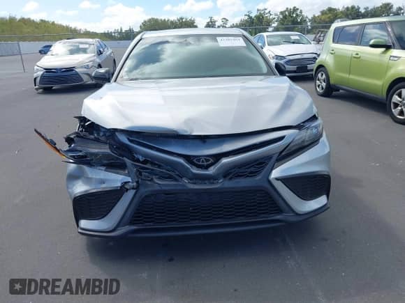 2021 Toyota Camry SE with VIN 4T1G11AK2MU445593, listed as a IAAI auction lot 43385464 with 57,907 mi miles and . Bid and sale history available at DreamBid. Image 12.