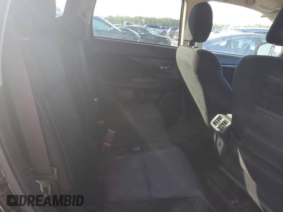 2020 Mitsubishi Outlander ES z VIN JA4AZ3A36LZ026357, wystawiony jako Copart lot #87419915 z przebiegiem 92 497 mil mil oraz Szkoda całkowita • Salvage title. Historia ofert i sprzedaży dostępna na DreamBid. Obrazek 11.