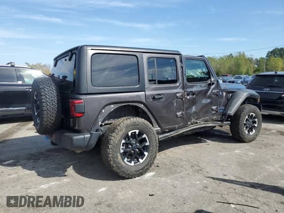 2024 Jeep Wrangler Rubicon z VIN 1C4RJXR66RW291716, wystawiony jako Copart lot #84422185 z przebiegiem 38 014 mil mil oraz Szkoda całkowita • Salvage title. Historia ofert i sprzedaży dostępna na DreamBid. Obrazek 3.