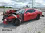 2016 Dodge Challenger SXT с VIN 2C3CDZAG4GH305500, выставлен на аукционе Copart как лот 68130885 с пробегом 125 557 миль миль и Списание • Salvage title. История ставок и продаж доступна на DreamBid. Изображение 1.