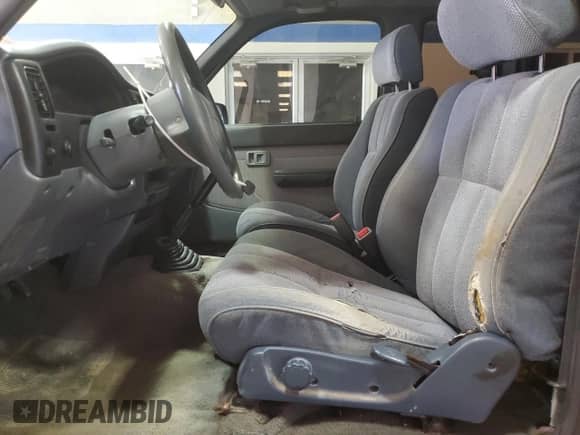 1997 Toyota Tacoma z VIN 4TAVL52N6VZ291508, wystawiony jako Copart lot #82747565 z przebiegiem 233 670 mil mil oraz Szkoda całkowita • Salvage title. Historia ofert i sprzedaży dostępna na DreamBid. Obrazek 7.