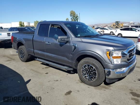 2021 Ford F-150 XLT with VIN 1FTEX1C57MKE58370, listed as a Copart auction lot 74724544 with 29,283 mi miles and Salvage title. Bid and sale history available at DreamBid. Image 4.