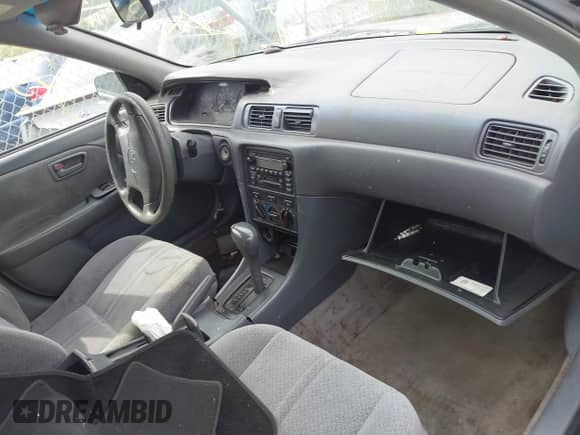 2000 Toyota Camry LE z VIN JT2BG22K2Y0467133, wystawiony jako IAAI lot #43108107 z przebiegiem Nie podano mil oraz . Historia ofert i sprzedaży dostępna na DreamBid. Obrazek 5.