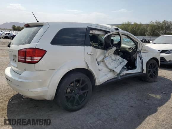 2015 Dodge Journey American Value z VIN 3C4PDCAB3FT699639, wystawiony jako Copart lot #64864155 z przebiegiem 117 623 mil mil oraz Szkoda całkowita • Salvage title. Historia ofert i sprzedaży dostępna na DreamBid. Obrazek 3.