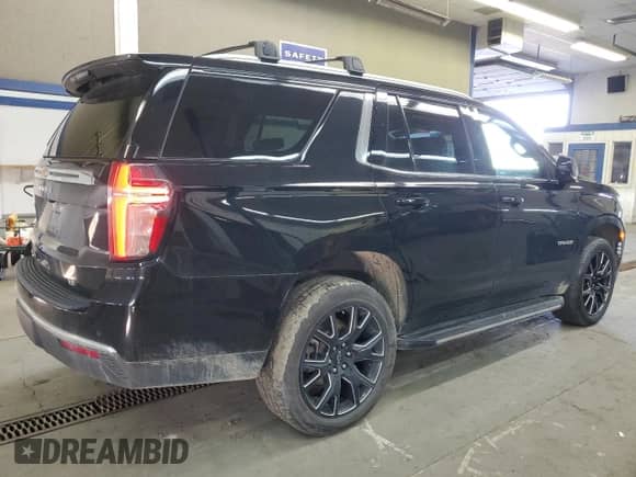 2023 Chevrolet Tahoe LT с VIN 1GNSKNKTXPR357772, выставлен на аукционе Copart как лот 46880395 с пробегом 51 428 миль миль и Списание • Salvage title. История ставок и продаж доступна на DreamBid. Изображение 3.