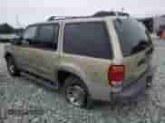 2000 Ford Explorer XLS with VIN 1FMZU72X0YZB45945, listed as a Copart auction lot 69550585 with 154,617 mi miles and Salvage title. Bid and sale history available at DreamBid. Image 2.