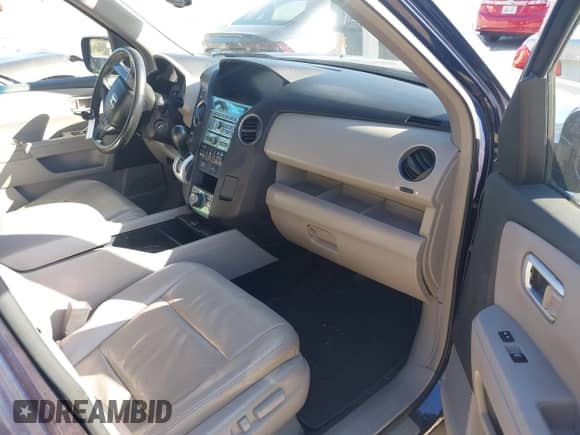 2009 Honda Pilot Touring with VIN 5FNYF489X9B007452, listed as a IAAI auction lot 43262557 with 206,355 mi miles and . Bid and sale history available at DreamBid. Image 5.