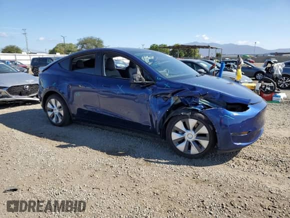 2021 Tesla Model Y Long Range with VIN 5YJYGAEE8MF174415, listed as a Copart auction lot 89557375 with 55,722 mi miles and Salvage title. Bid and sale history available at DreamBid. Image 4.